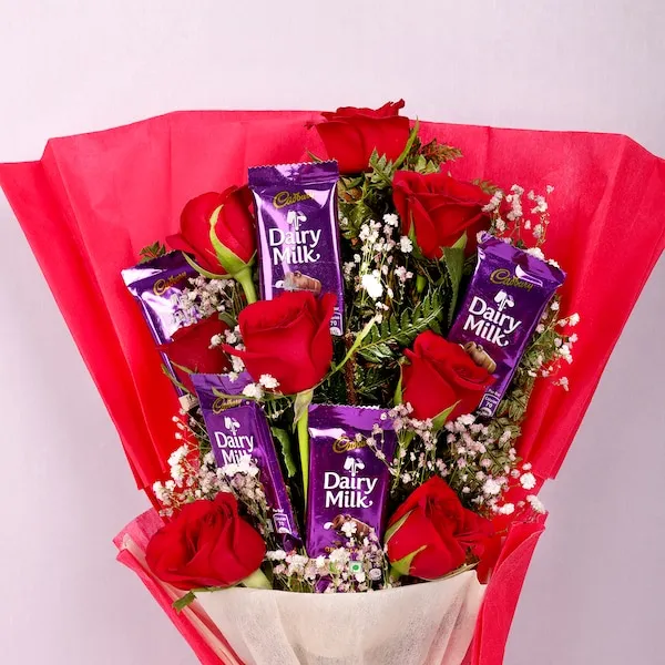roses and chocolate arrangement roses and chocolate arrangement