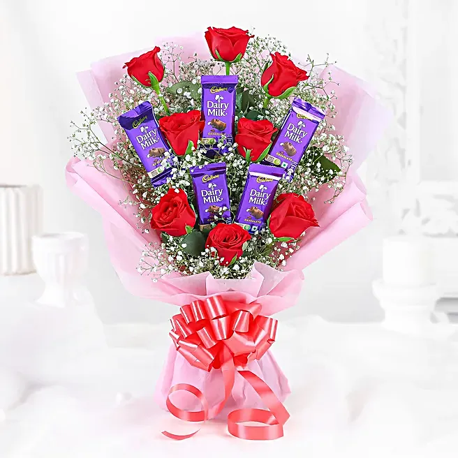 red roses bouquet & dairy milk chocolates red roses bouquet & dairy milk chocolates