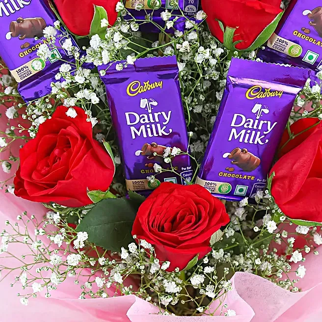 red roses bouquet & dairy milk chocolates red roses bouquet & dairy milk chocolates